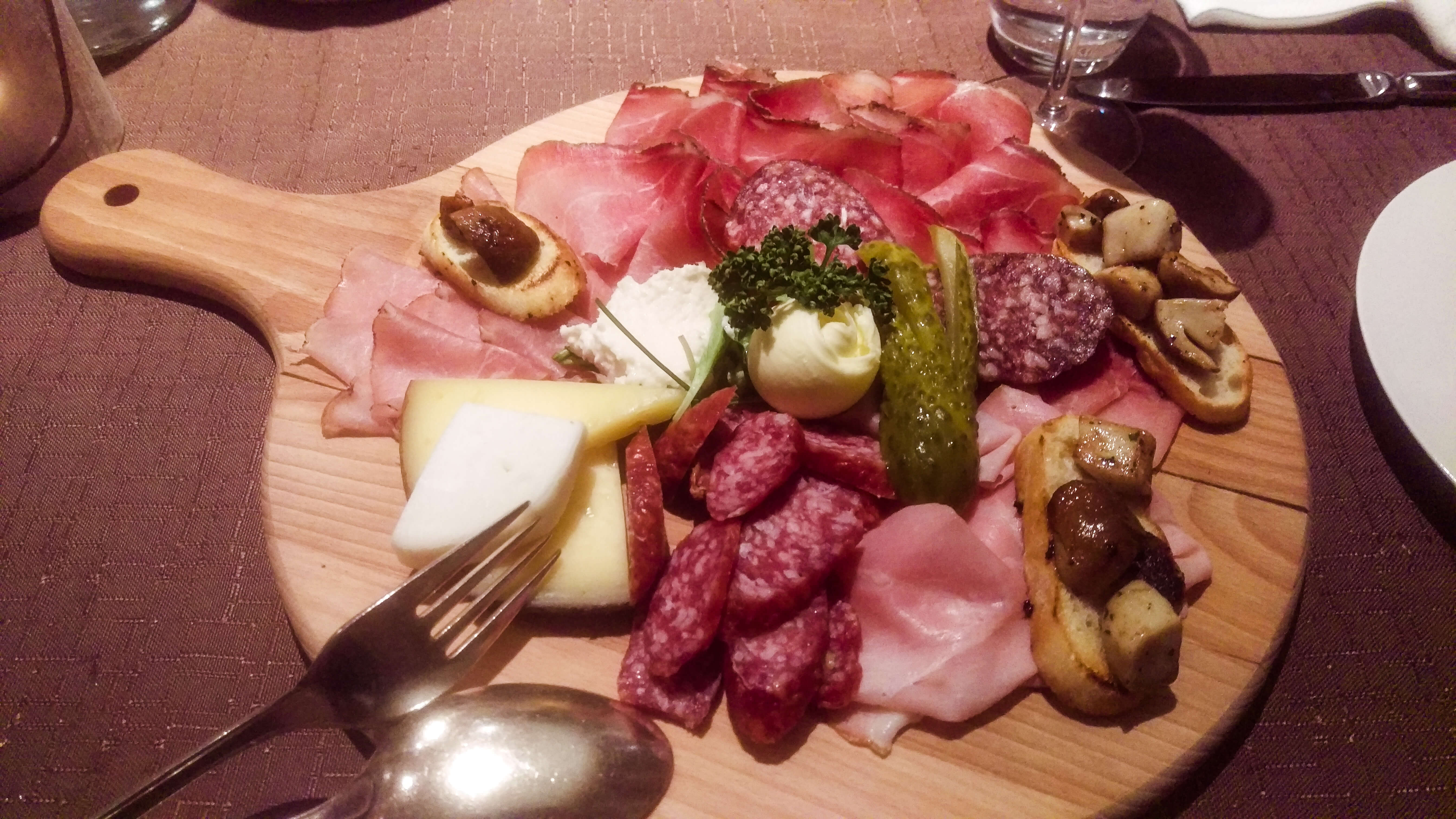 platter-of-meats-and-cheese-showing-the-food-is-a-great-reason-to-ski-in-italy